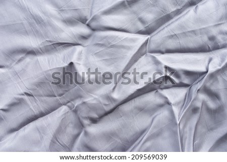 Creased fabric background or texture