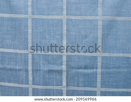 Blue checked fabric background or texture