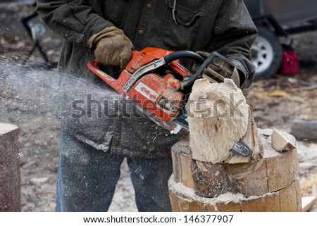 Electric Saw bear head sculpture in Alaska