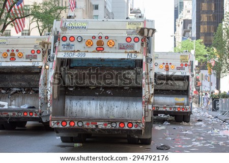 NEW YORK CITY - JUNE 14 2015: Trucks are cleaning the street after Annual Puerto Rico Day Parade that filled 5th Avenue with some 80,000 marchers & more than one million spectators