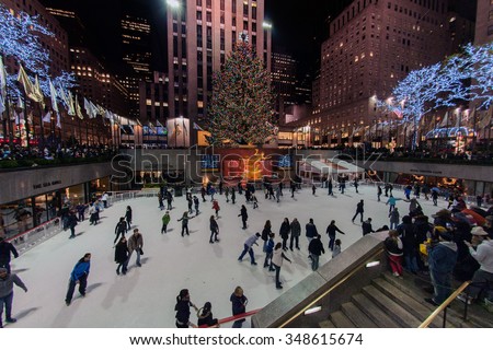 NEW YORK, USA - DECEMBER 9, 2011 - Town People skating at rockfeller center celebrating christmas in manhattan streets