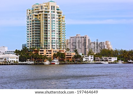 Miami city waterfront buildings and boats. Miami downtown view from the water.