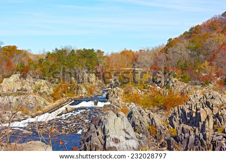 Great Falls National Park in autumn, Virginia USA. Colorful foliage and blue waters of Potomac at park in the morning.