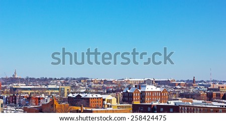 Suburb of US capital city in winter. City buildings covered in snow after the storm in Washington DC.