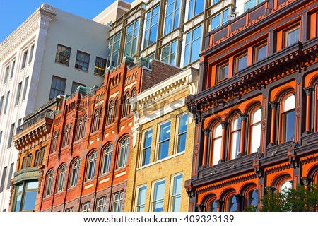Architectural elements of Washington DC buildings. Metro Center neighborhood buildings under the afternoon sun.