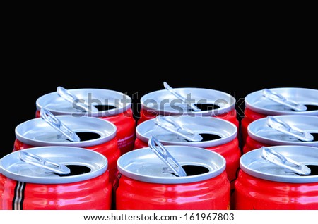 Aluminum cans for recycling on black background