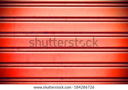 red with light metal security roller door background