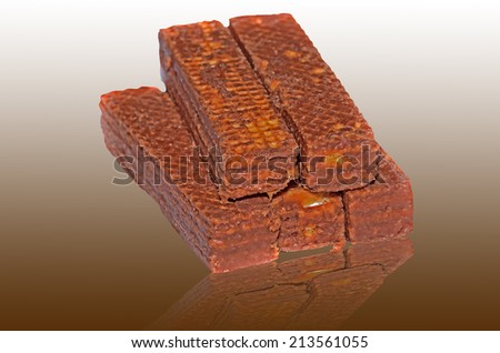 chocolate wafers on brown background