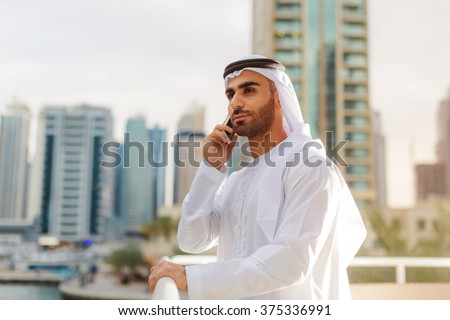 Arab Entrepreneur taking over phone