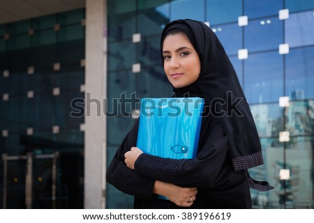Arab Student holding a folder