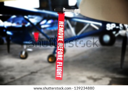 Aviation & airplane detail - remove before flight ribbon in a Pitot tube