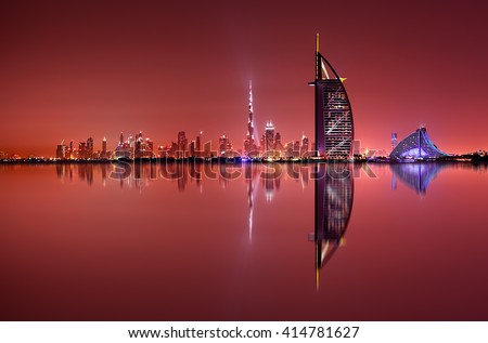 Dubai skyline reflection at amazing night, Dubai, United Arab Emirates