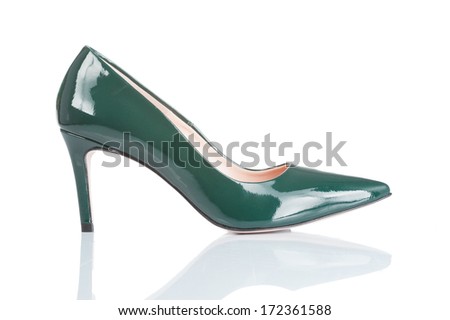side of green varnished leather female high heel shoe. isolated on white