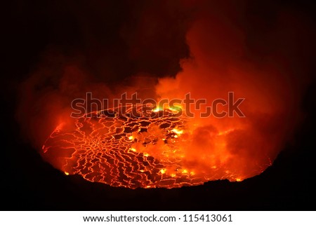 Nighttime view of lava lake in pit crater, Nyiragongo Volcano, Democratic Republic Congo