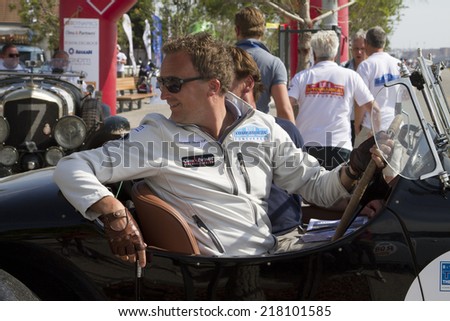 THESSALONIKI, GREECE- MAY 13, 2014: Participants of the rally Tour Amical in their car. A Classic Car Rally, in Thessaloniki, Greece.