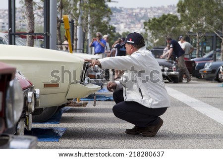 THESSALONIKI, GREECE- MAY 13, 2014: Classic cars of the participants of the rally Tour Amical in their car. A Classic Car Rally, in Thessaloniki, Greece.