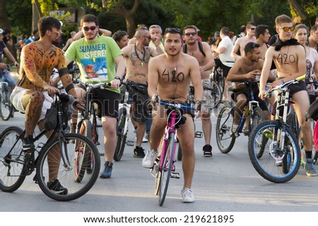 THESSALONIKI, GREECE- JUNE 6, 2014: 7th World Naked Bike Ride. Hundreds of cyclists either naked or half naked demanding a more sustainable Thessaloniki to mobility and cycling. Thessaloniki, Greece
