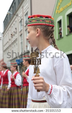 ZYWIEC, POLAND - AUGUST 6 2009: Participants of the 46th Beskidy Highlanders Week of Culture (TKB), the biggest folk culture event in Eastern Europe, parade through the city, folk group from Austria