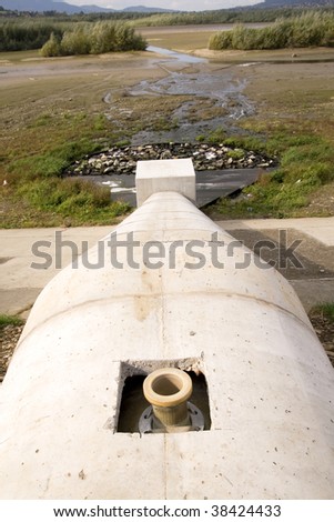 sewage pipe and dry lake