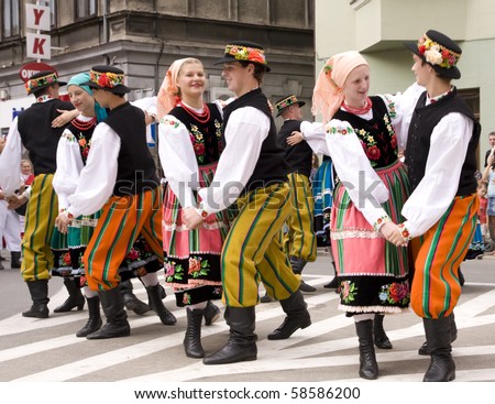 ZYWIEC, POLAND - AUGUST 5:  Participants of the 47th Beskidy Highlanders Week of Culture (TKB), the biggest folk culture event in Eastern Europe, parade through the city, folk group from Poland on August 5, 2010 in Zywiec, Poland