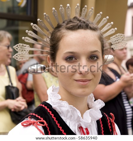 ZYWIEC, POLAND - AUGUST 5: Participants of the 47th Beskidy Highlanders Week of Culture (TKB), the biggest folk culture event in Eastern Europe, parade through the city, folk group from Italy on August 5, 2010 in Zywiec, Poland