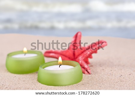 romantic candle set on the beach