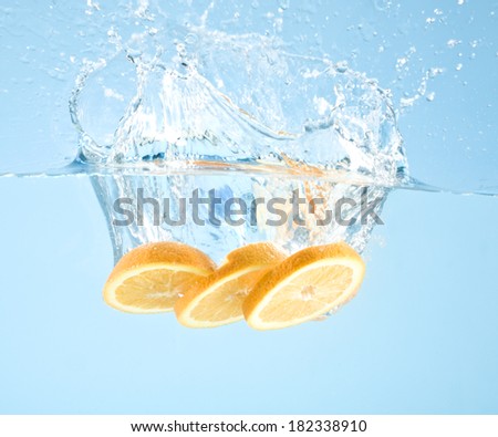 fruits splashed into water