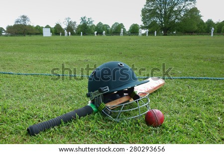 Cricket match on English village green