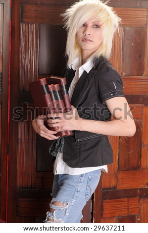 Young man with books and bleached hair