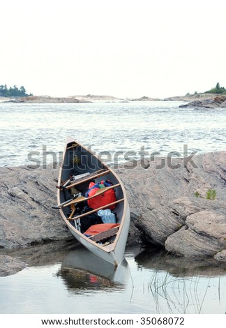 White canoe on Georgian Bay shore