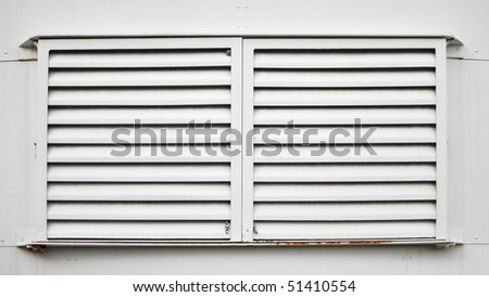 Window with metal blinds