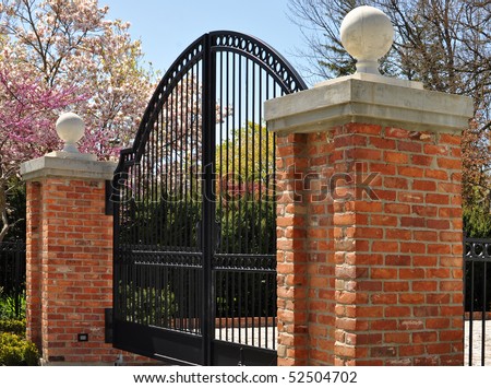 Iron gate and two masonry posts