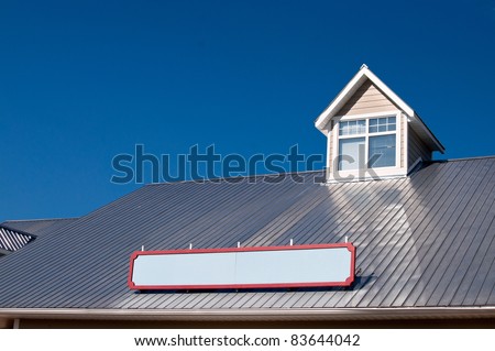Dormer window on metal roof