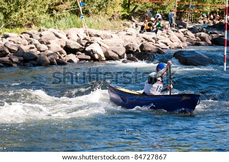 MINDEN, ONTARIO, CANADA - SEPT. 10: An unidentified contestant competes at Open Canoe Slalom Race, 2011 at Gull River in Minden, Ontario, Canada on September 10, 2011.