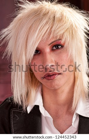 Young man with piercing and bleached hair