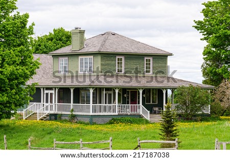 Country home with a wrap-around veranda