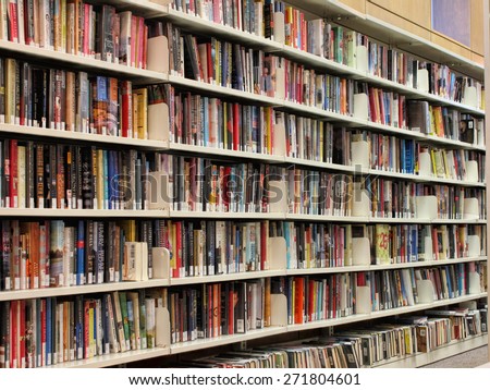 RICHMOND HILL - NOV 29: Book shelves with colorful book spines in a public library in Richmond Hill on November 29, 2008