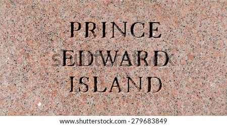 Prince Edward Island sign engraved in a rock plate