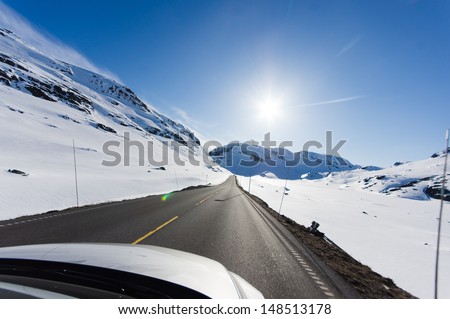 Asphalt Road Among Snow