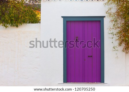 Colored wooden door frame in Hydra Island Greece Saronikos Gulf