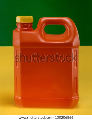 Engine oil can with a cap on
