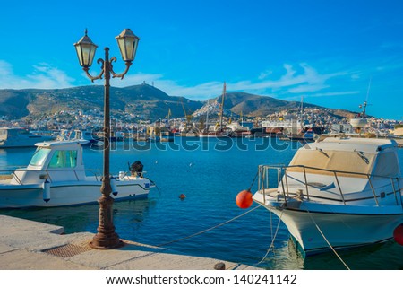 Greece Syros Island, Yachts and fishing boats into main Harbor of Syros island in Cyclades