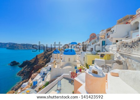 Greece Santorini island in Cyclades, traditional white washed view of houses in main capitol above the sea of caldera at summer
