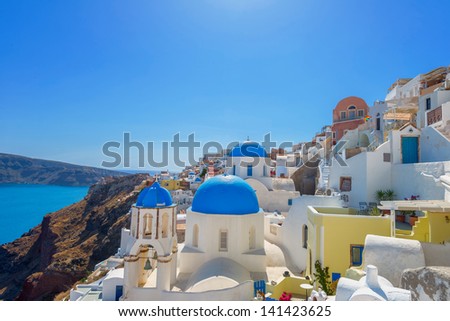Greece Santorini island in Cyclades, traditional white washed view of houses in main capitol above the sea of caldera at summer