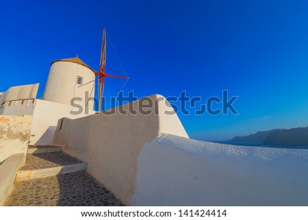 Greece Santorini island in Cyclades,  beautiful  wide view of windmills above the sea of caldera