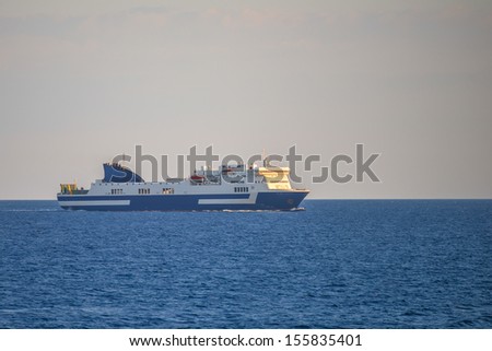 Greece ithaki,cruise ship traveling in open sea in mediterranean at a summer day