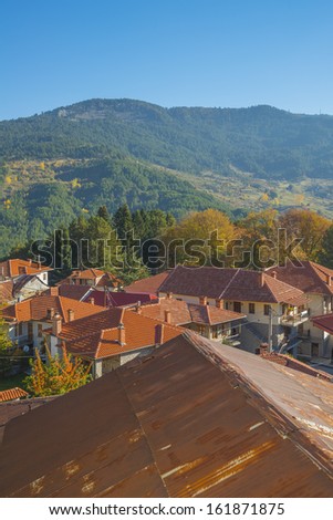 View of a traditional village house in the fall with all the colorful foliage