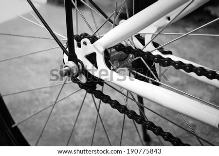 Closeup photo of some bicycle parts with black and white