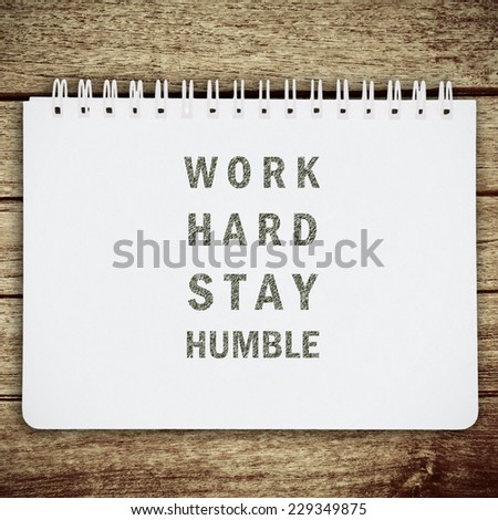 Work quote on white notebook background. Inspiration motivational background. Life quote.