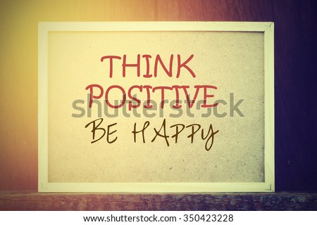 Think Positive Be Happy: Inspiration Motivation Life Quotes on Wood Frame Vintage Background Design.